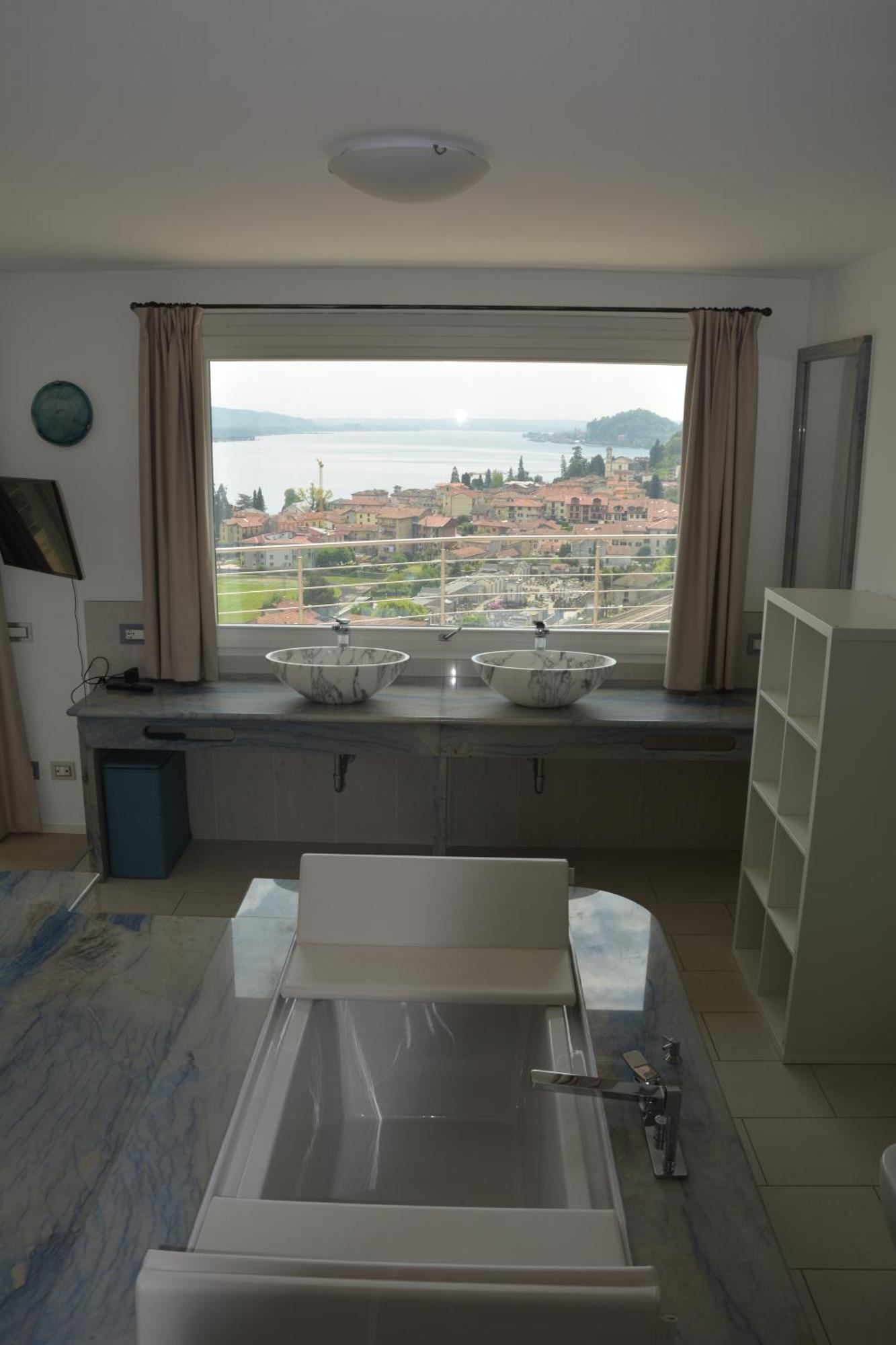 Il Girasole Appartement Meina Kamer foto